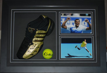 Signed tennis shoe and ball